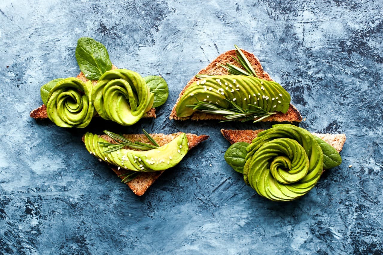 Avocado on toasted bread, cut into triangles